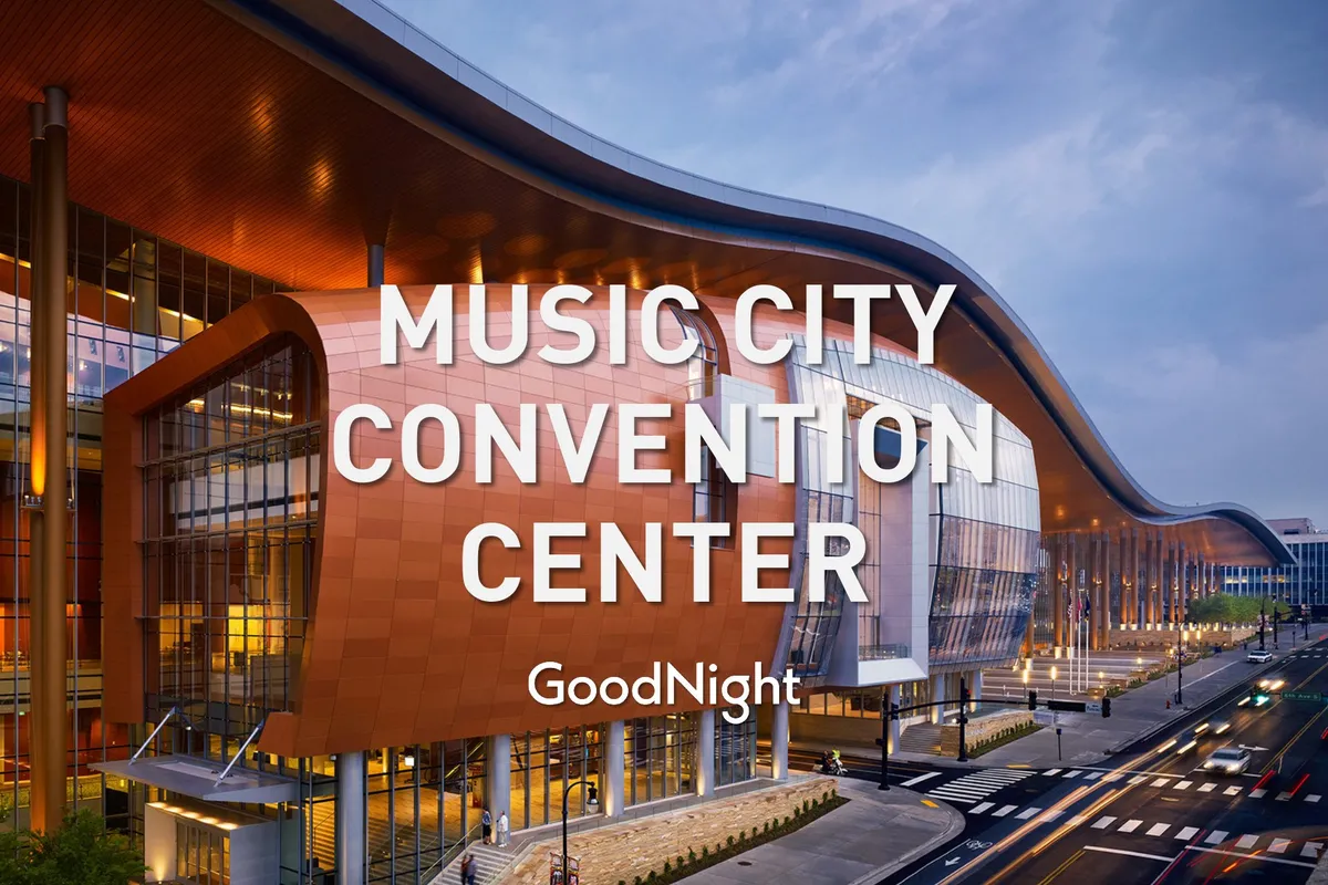 Featuring a dynamic, curved roofline and a large glass facade, this image is of a modern architectural convention or events center. The space is designed for business, conferences, and social gatherings, highlighting Nashville's accessible business and cultural venues.
